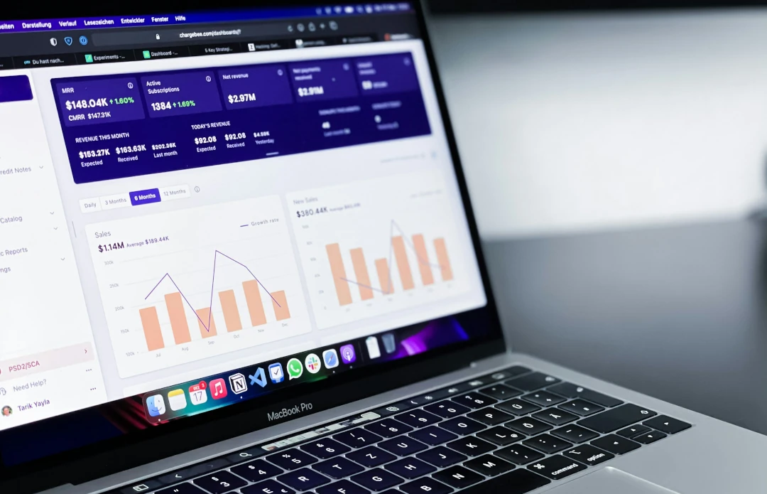 laptop showing charts and diagrams of data