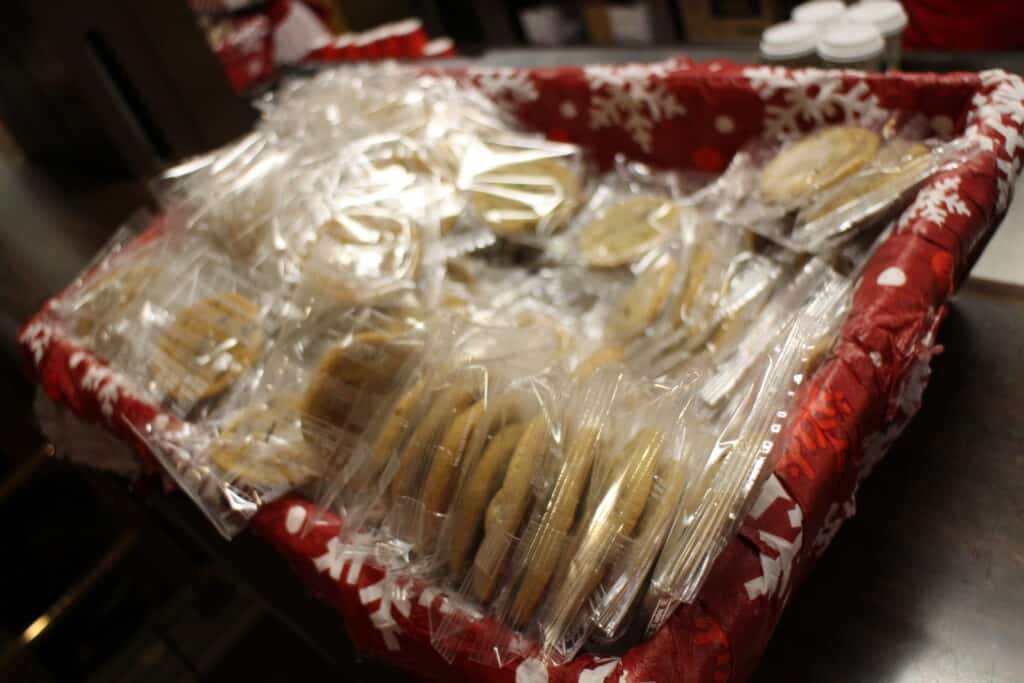 Individually wrapped cookies in a basket at Mickey's Very Merry Christmas Party.