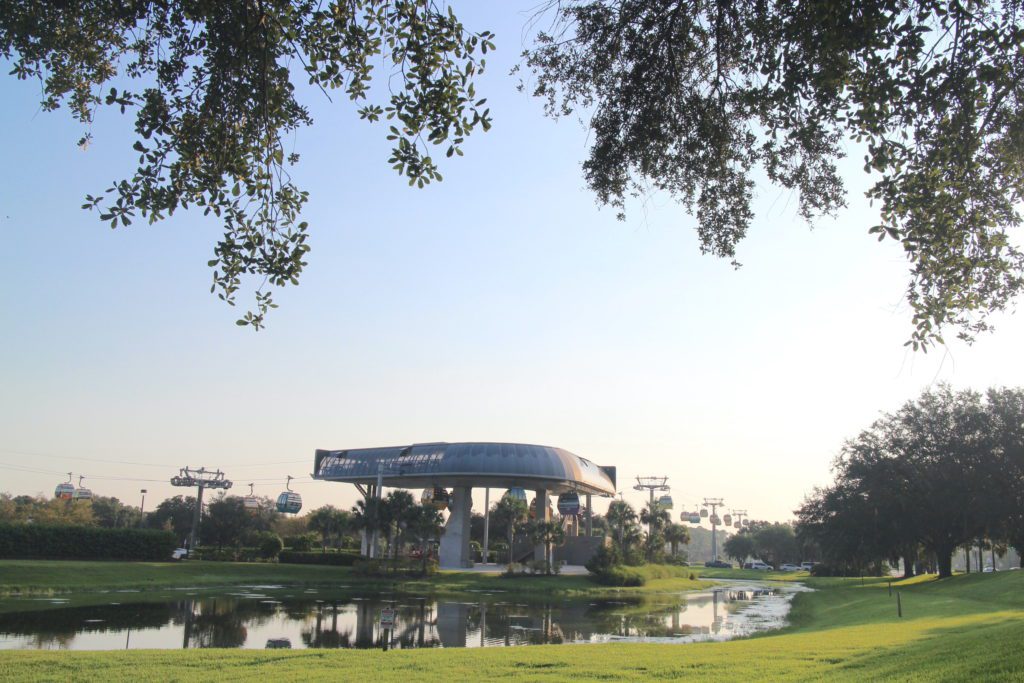 Disney Skyliner station in front of a pond