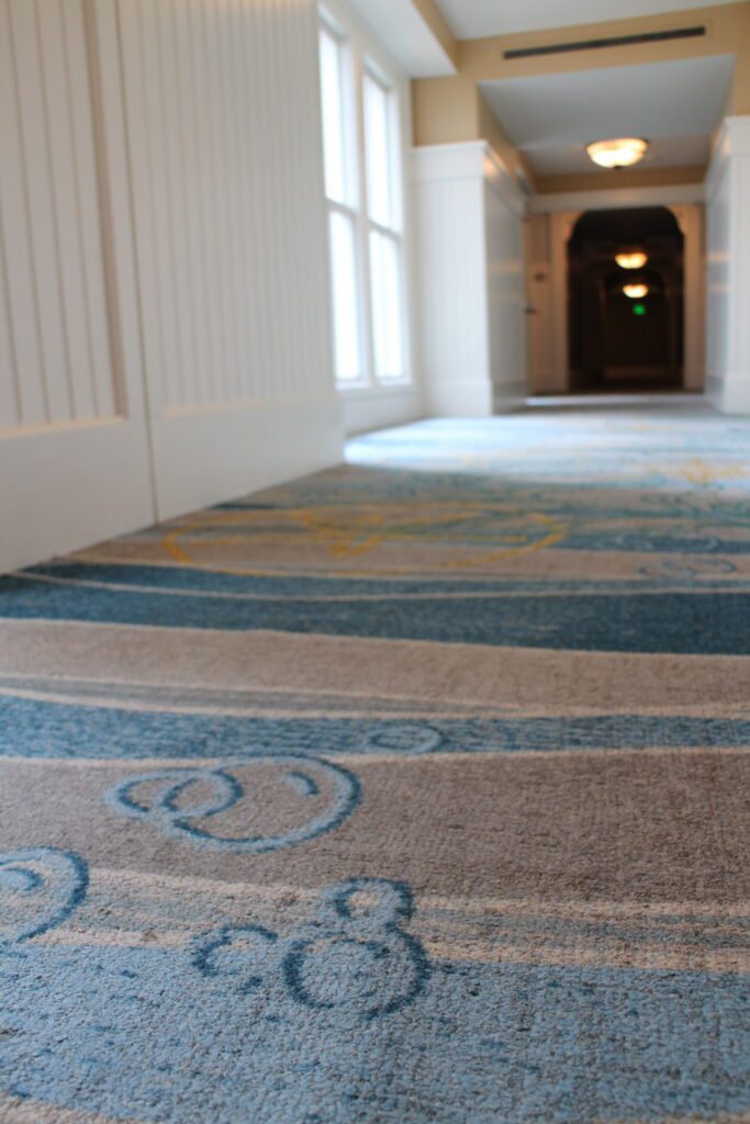 Beach club blue carpet with hidden Mickey 