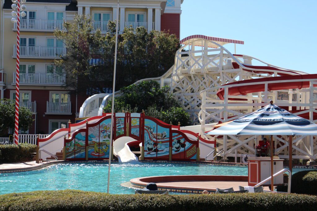 water slide in a sparkling blue pool
