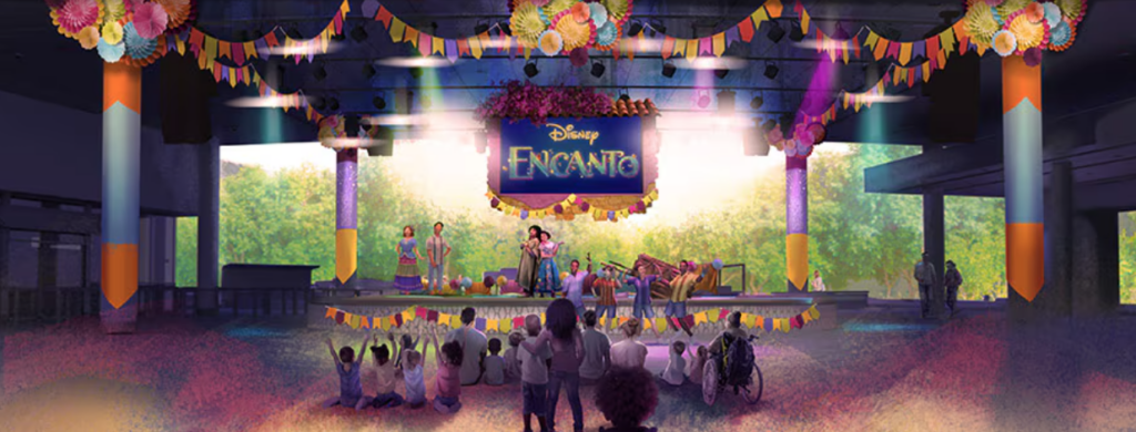 Epcot Encanto show with a simple stage and a few characters on it.