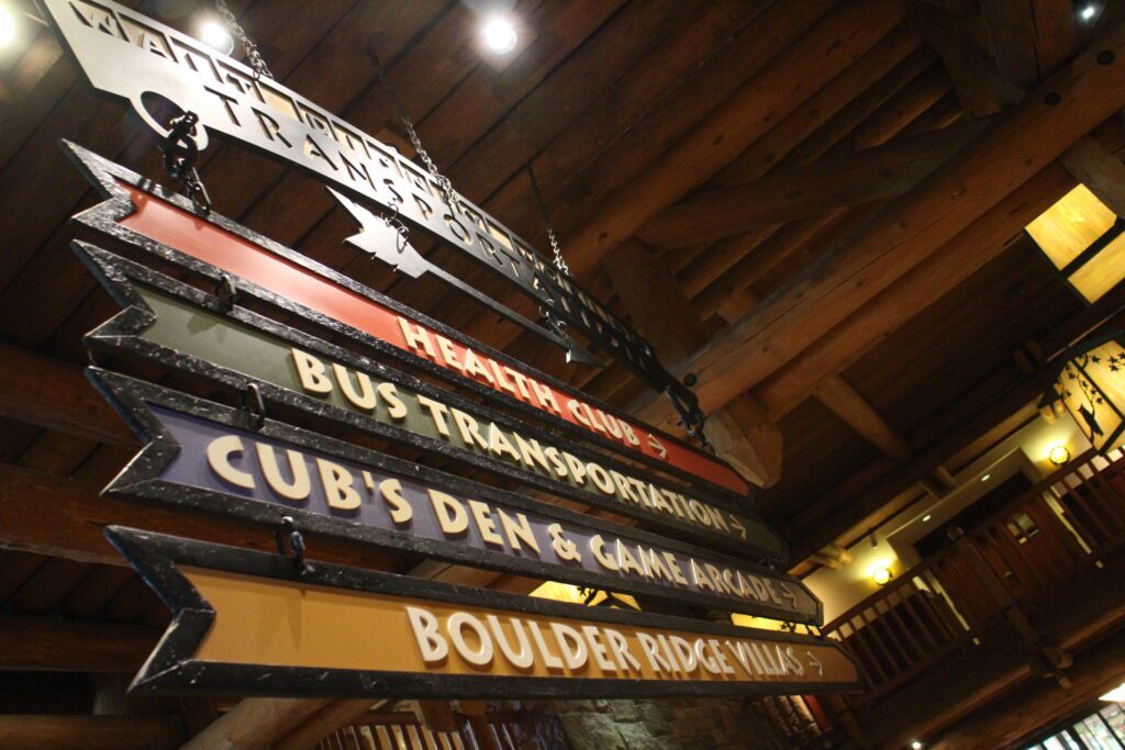 A sign pointing to different parts of Wilderness Lodge