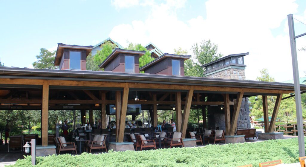 A view of the outdoor Geyser Point Bar and Grill. It has a rustic style roof but no walls.