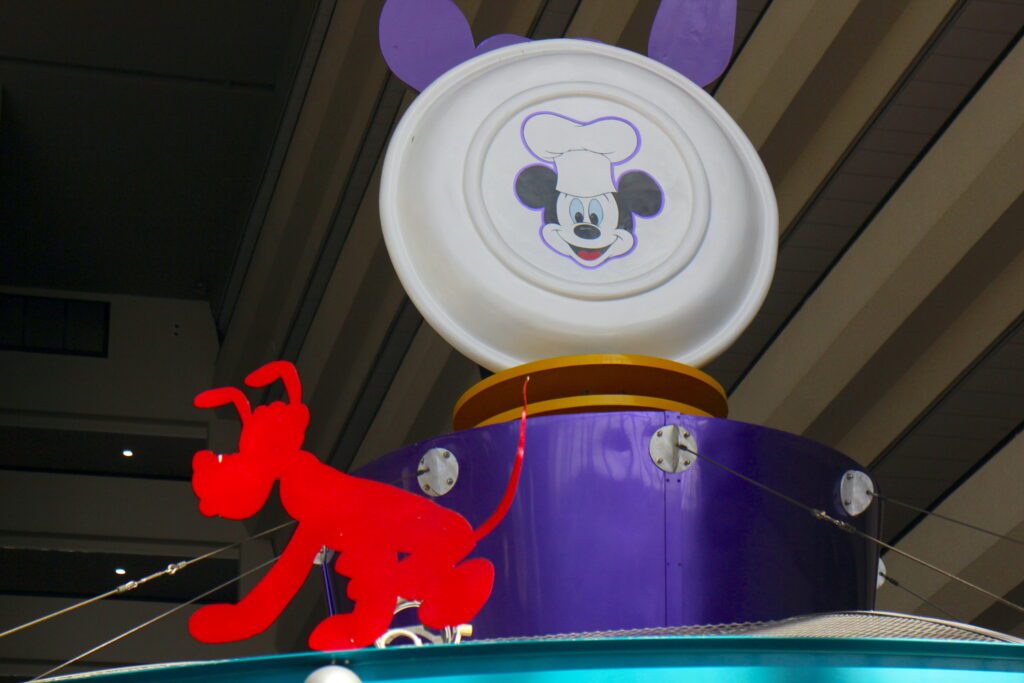 Chef Mickey's restaurant at Contemporary plate decoration with Mickey on it and Pluto cutout.