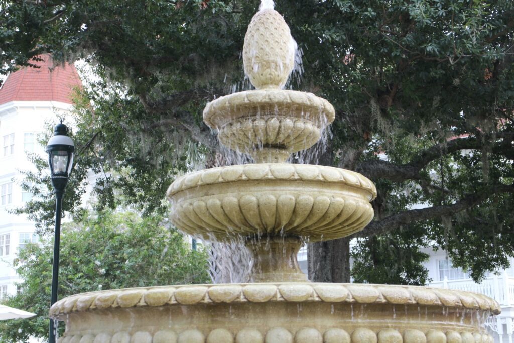 Grand Floridian fountain close up displaying water running down the layers.