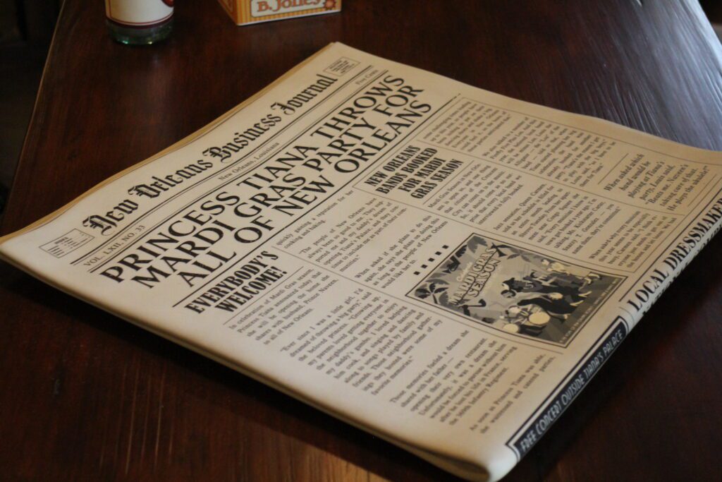 Tiana's Bayou Adventure queue newspaper.