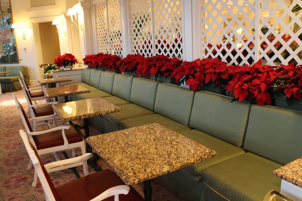 Grand Floridian tea room tables and chairs with a long bench.