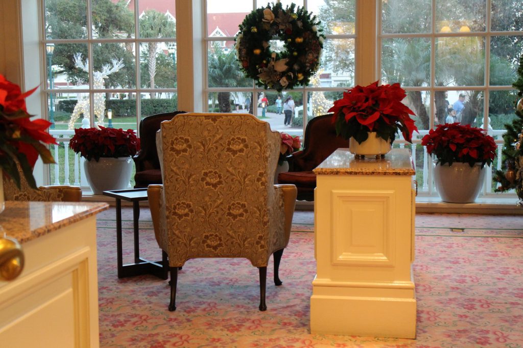 Grand Floridian tea room with classic style furniture and poinsettias.