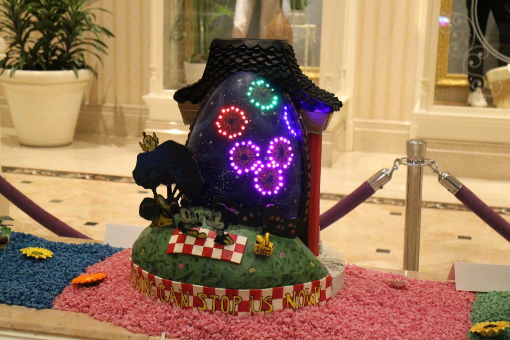 Mickey and Minnie's Runaway Railway Grand Floridian Easter egg featuring a picnic scene with light up fireworks on the egg.