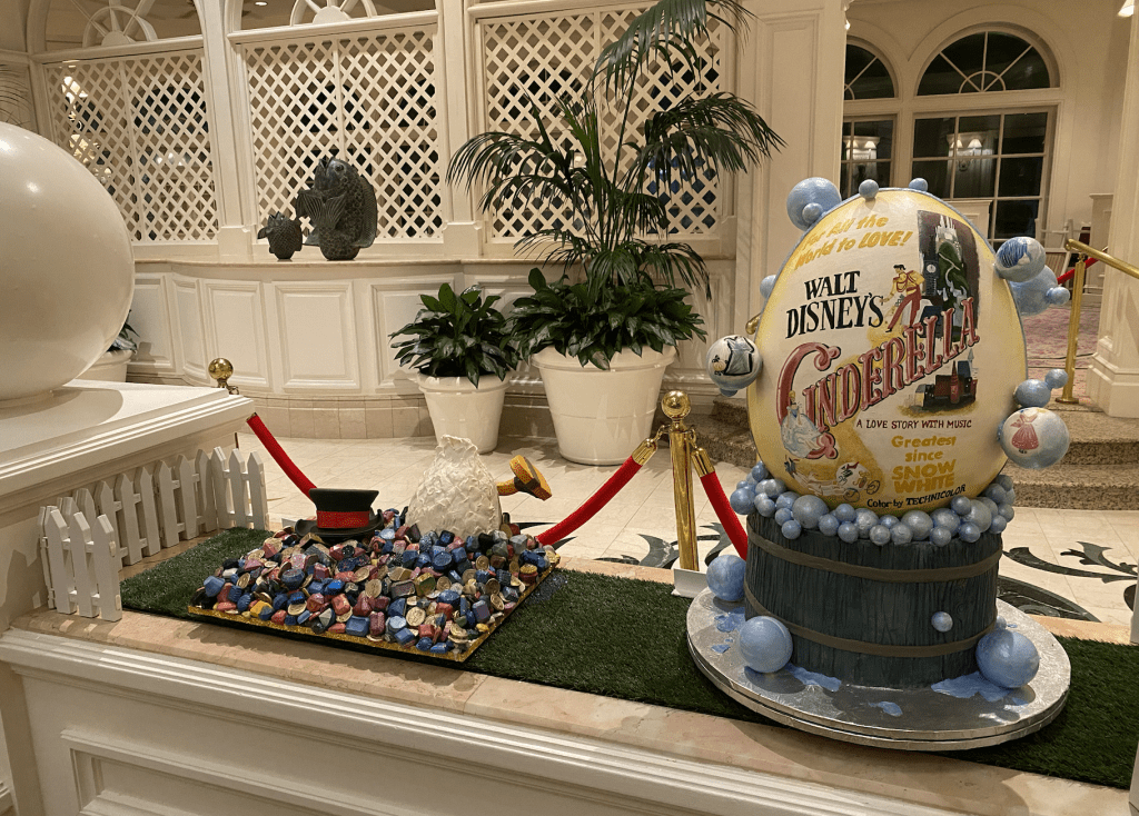 A Scrooge McDuck chocolate egg display sits next to a Cinderella one.