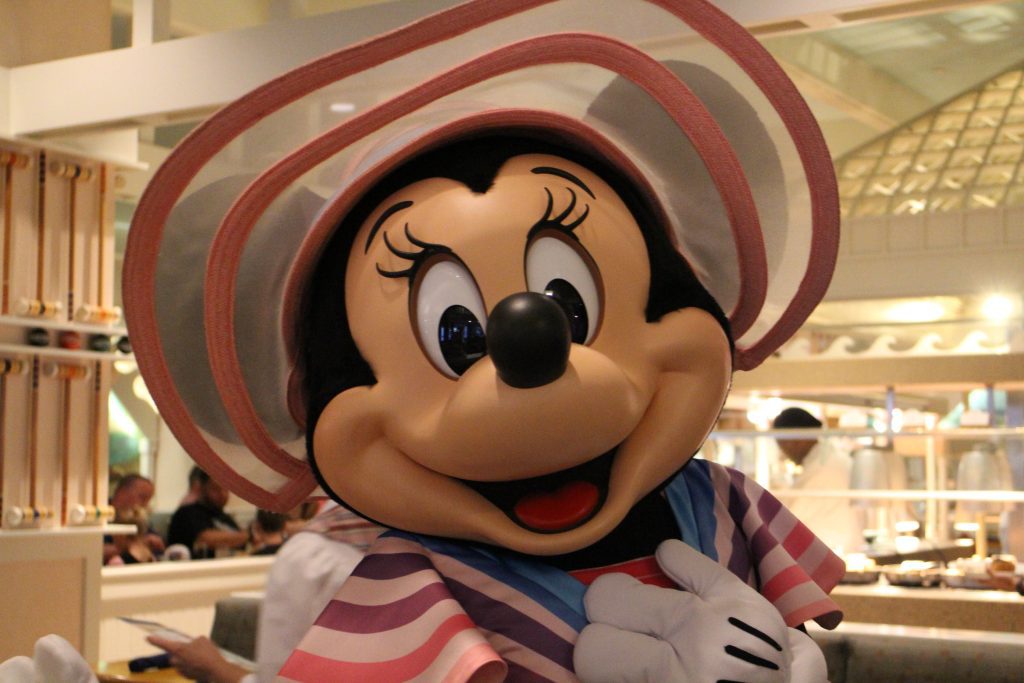Minnie Mouse at Cape May Cafe, a character meal at a Disney resort.