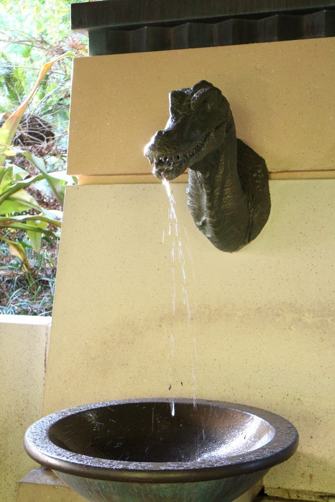 A Dinosaur fountain in the land at Animal Kingdom.