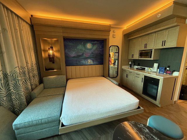 The pull down bed in the Polynesian Duo Studio reveals subtle Moana art.
