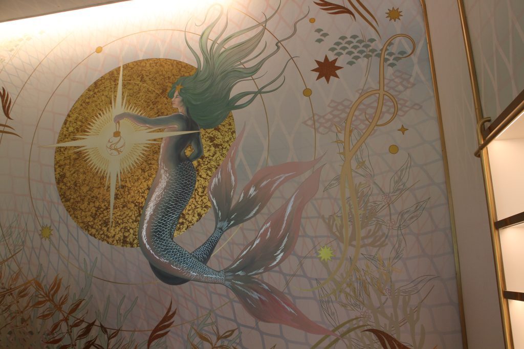 Epic Universe Starbucks mermaid wall