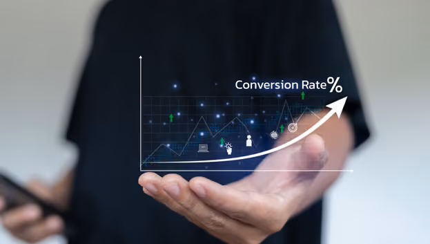 Person holding a glowing chart showing a rising conversion rate