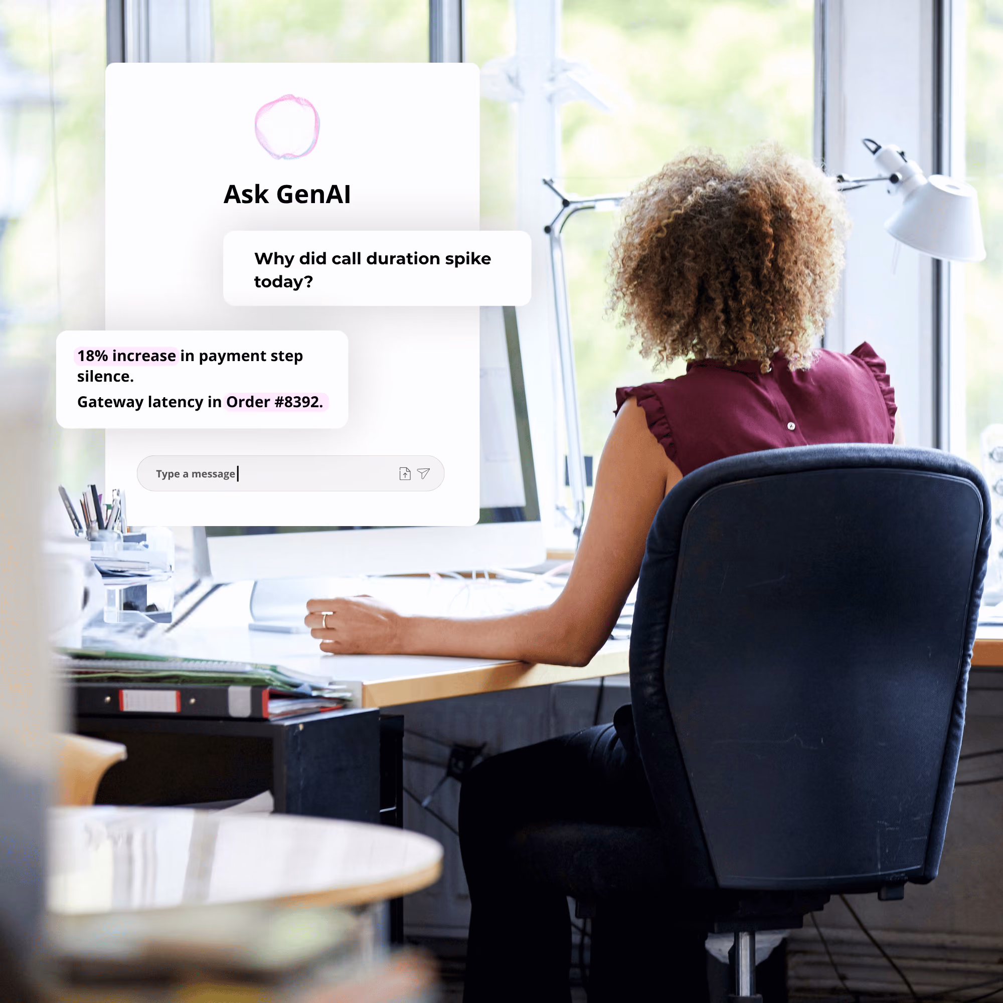 Analyst at a desk using an Ask GenAI panel that explains a spike in call duration