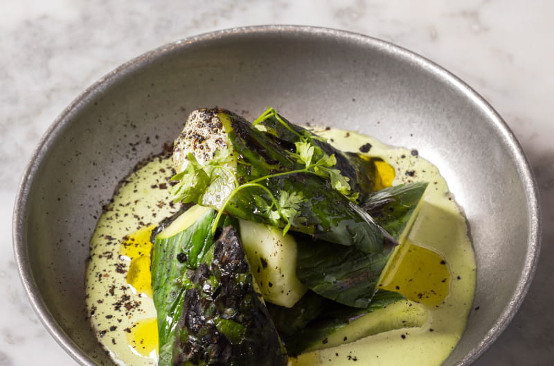 A close-up of freshly made dishes at No.FortyNine — vibrant ingredients, carefully plated