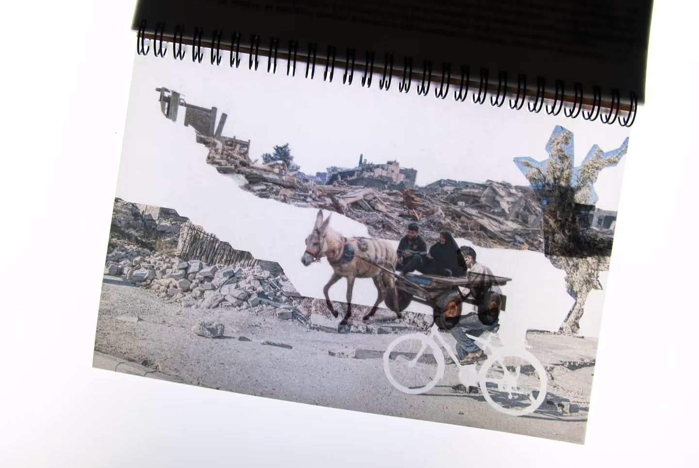 Close-up shot of one of the spreads from the ''Nowadays'' section of the book. Features a selection of a photograph from Syria overlaid with another from Palestine.