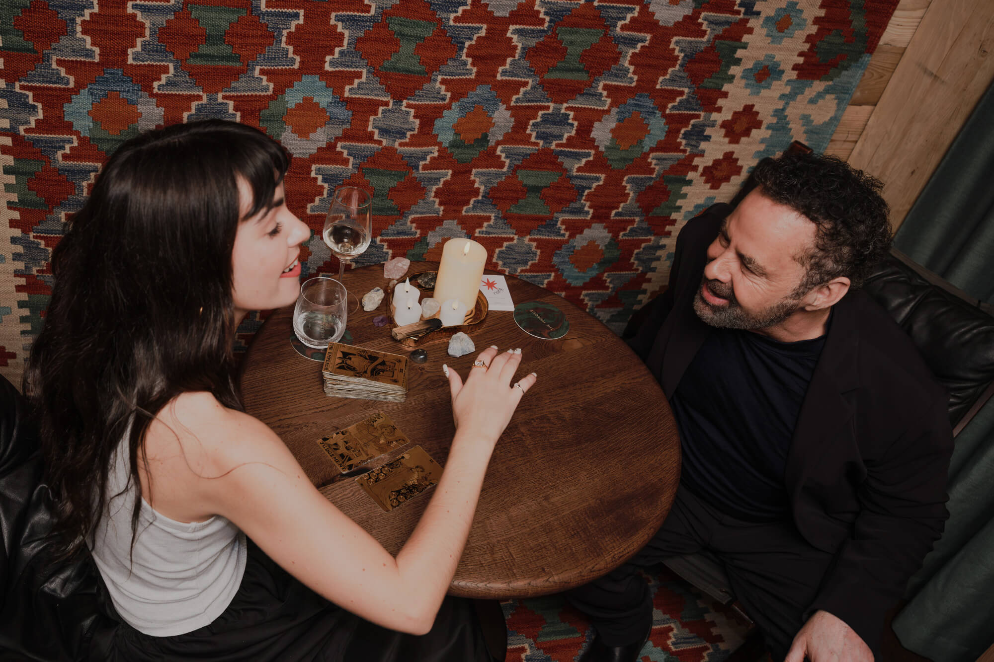 people sitting at table talking