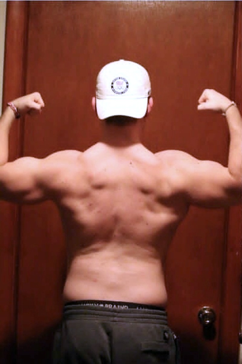 Caleb S. photographed from behind before restructuring his training