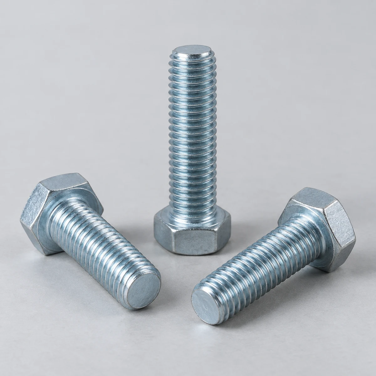Hex Bolt - DIN 933 family, blue-white zinc plated, fully threaded hex head (product illustration)