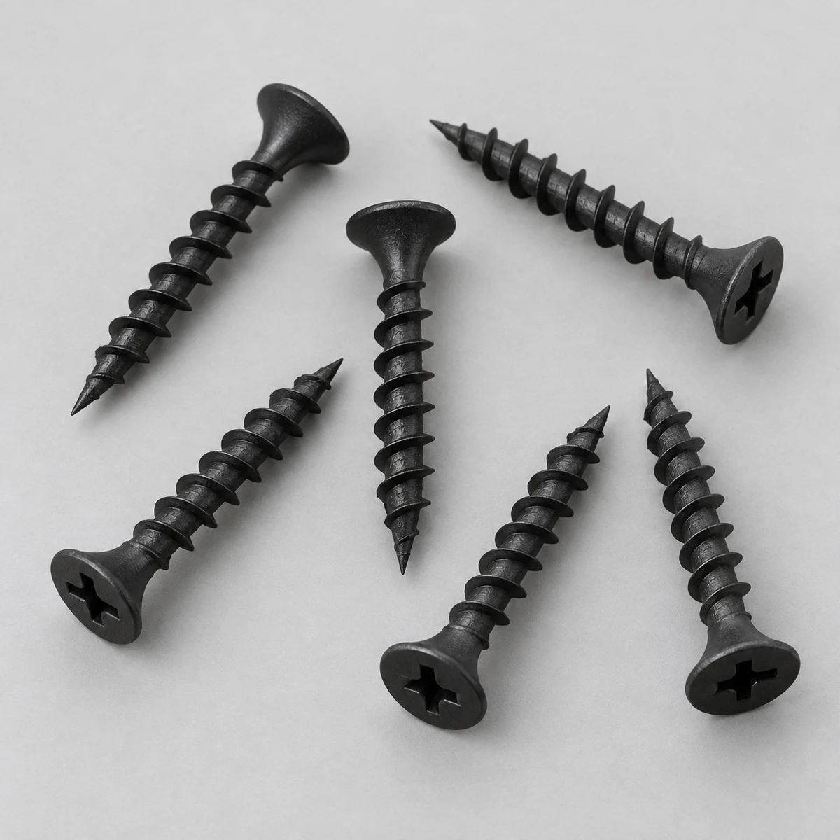 Drywall Screw - Steel, black phosphate finish, coarse thread and cross-recess bugle head (product illustration)