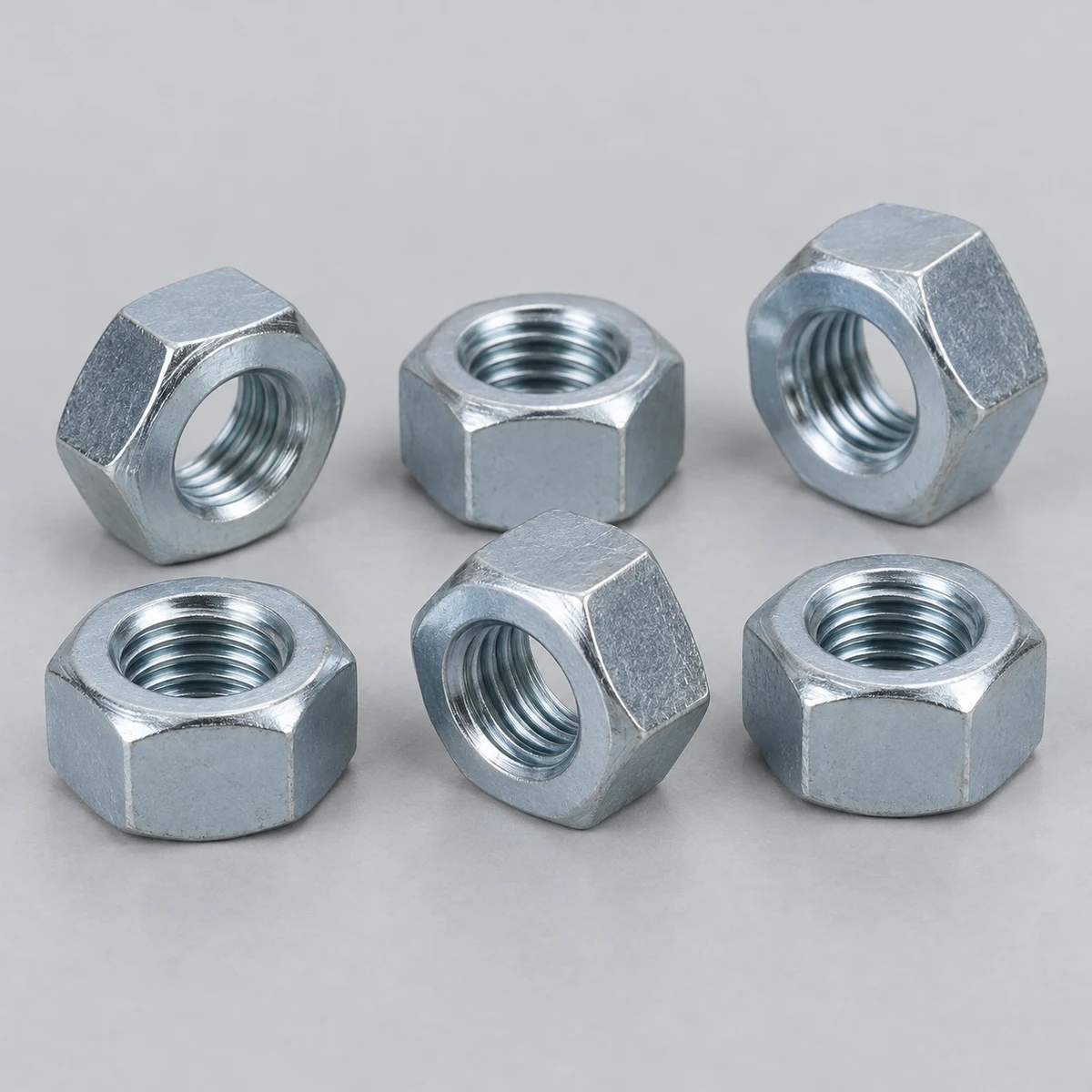 Hex Nut - DIN 934 family, steel, zinc plated, hex nuts with internal threads (product illustration)
