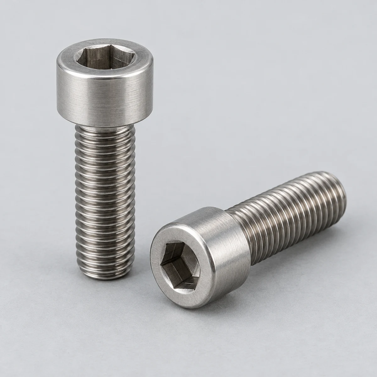 Socket Head Cap Screw - DIN 912 family, stainless steel natural finish, hex socket view (product illustration)