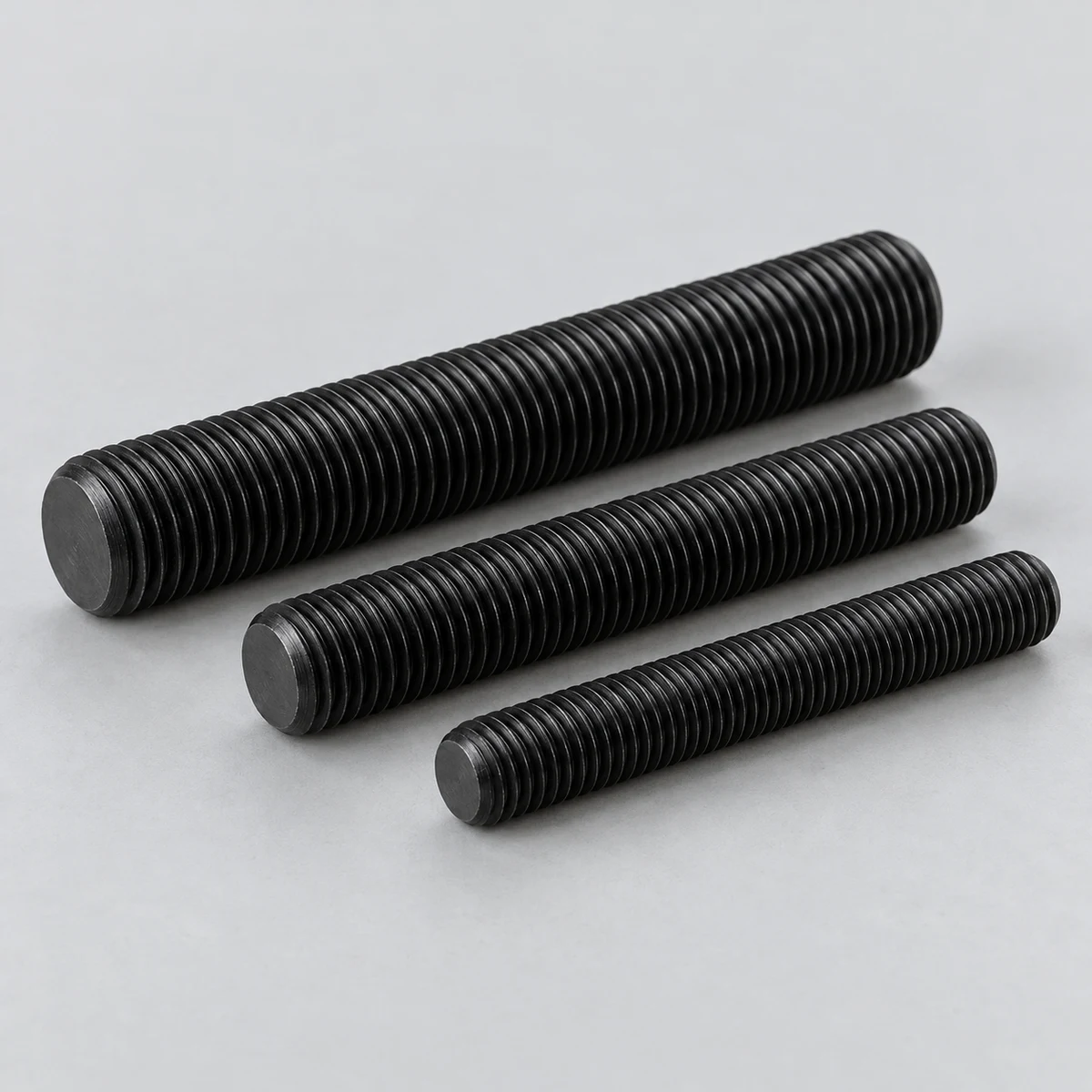 Threaded Rod - DIN 976 family, alloy steel, black finish, threaded ends (product illustration)
