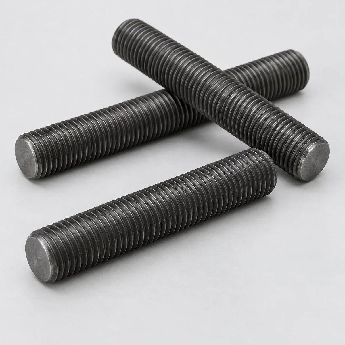 ASTM A193 B7 Threaded Rod - ASTM A193 B7 alloy steel, plain finish, crossed all-thread rods (product illustration)