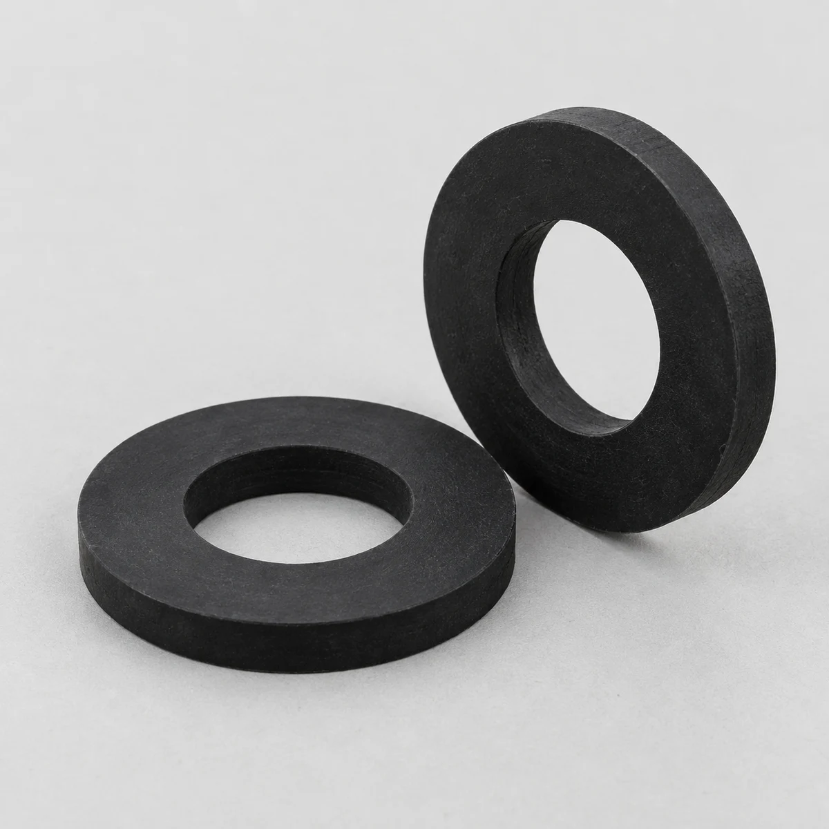 Rubber Washer - Black rubber, plain finish, alternate face and thickness view (product illustration)