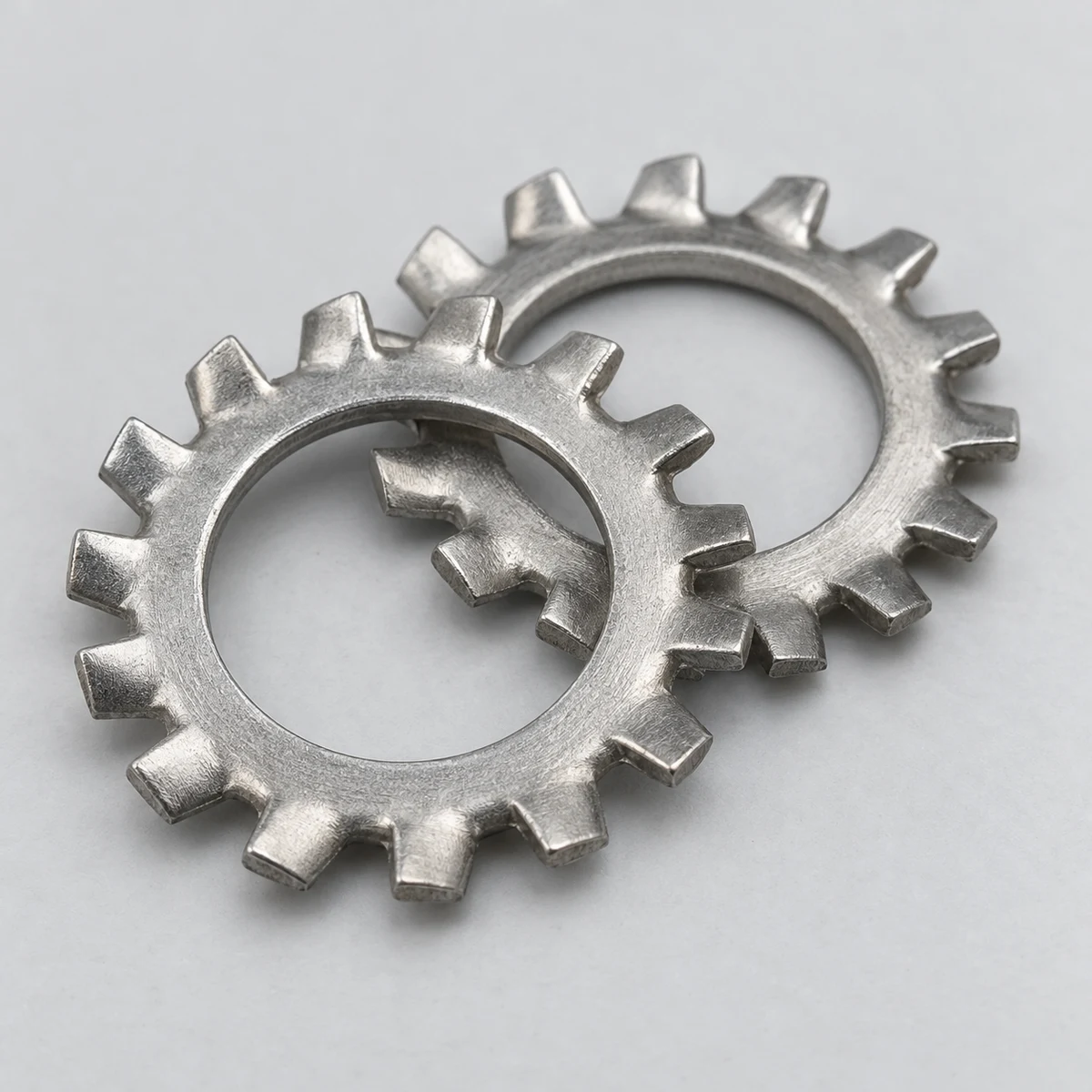 Serrated Lock Washer - DIN 6798 family, steel, natural finish, tooth and bore detail (product illustration)