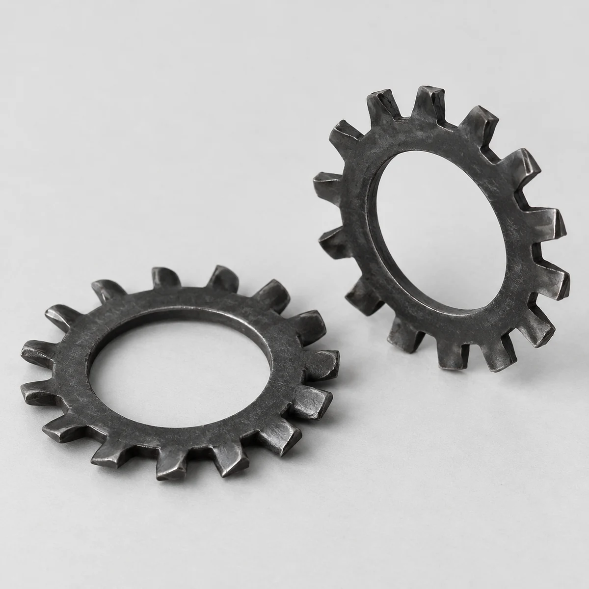 Serrated Lock Washer - DIN 6798 family, steel, black finish, external-tooth profile (product illustration)