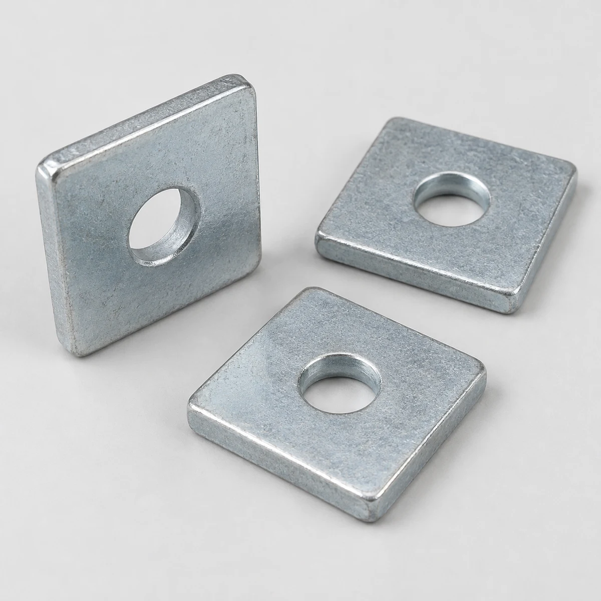 Square Washer - DIN 436 family, steel, zinc plated, square washers with round bores (product illustration)