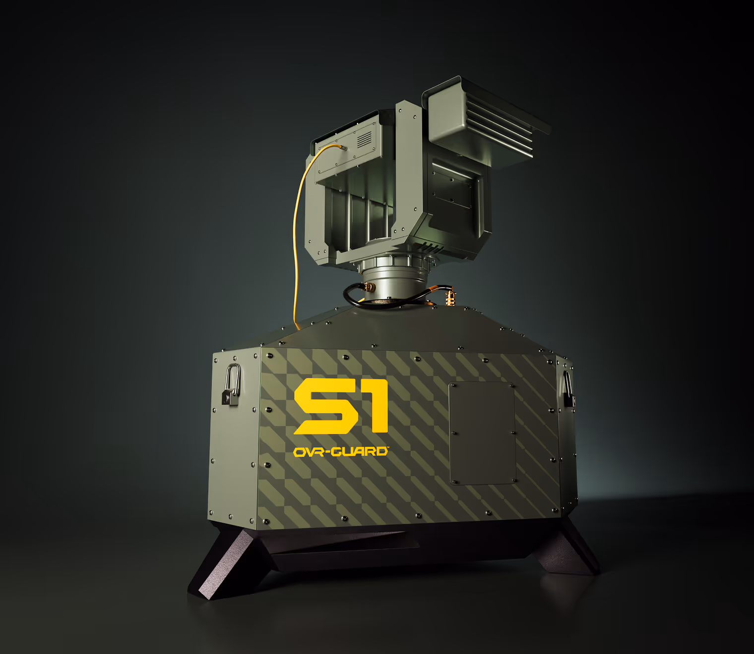 Green camouflaged security device labeled S1 OVR-GUARD with mounted sensor and cables.