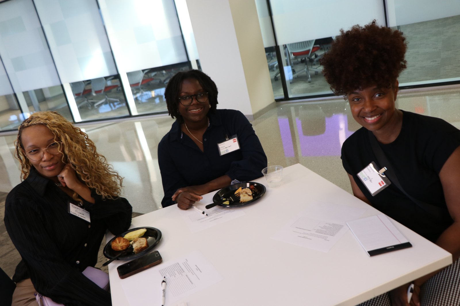 Three women at SMPHR professional networking meal