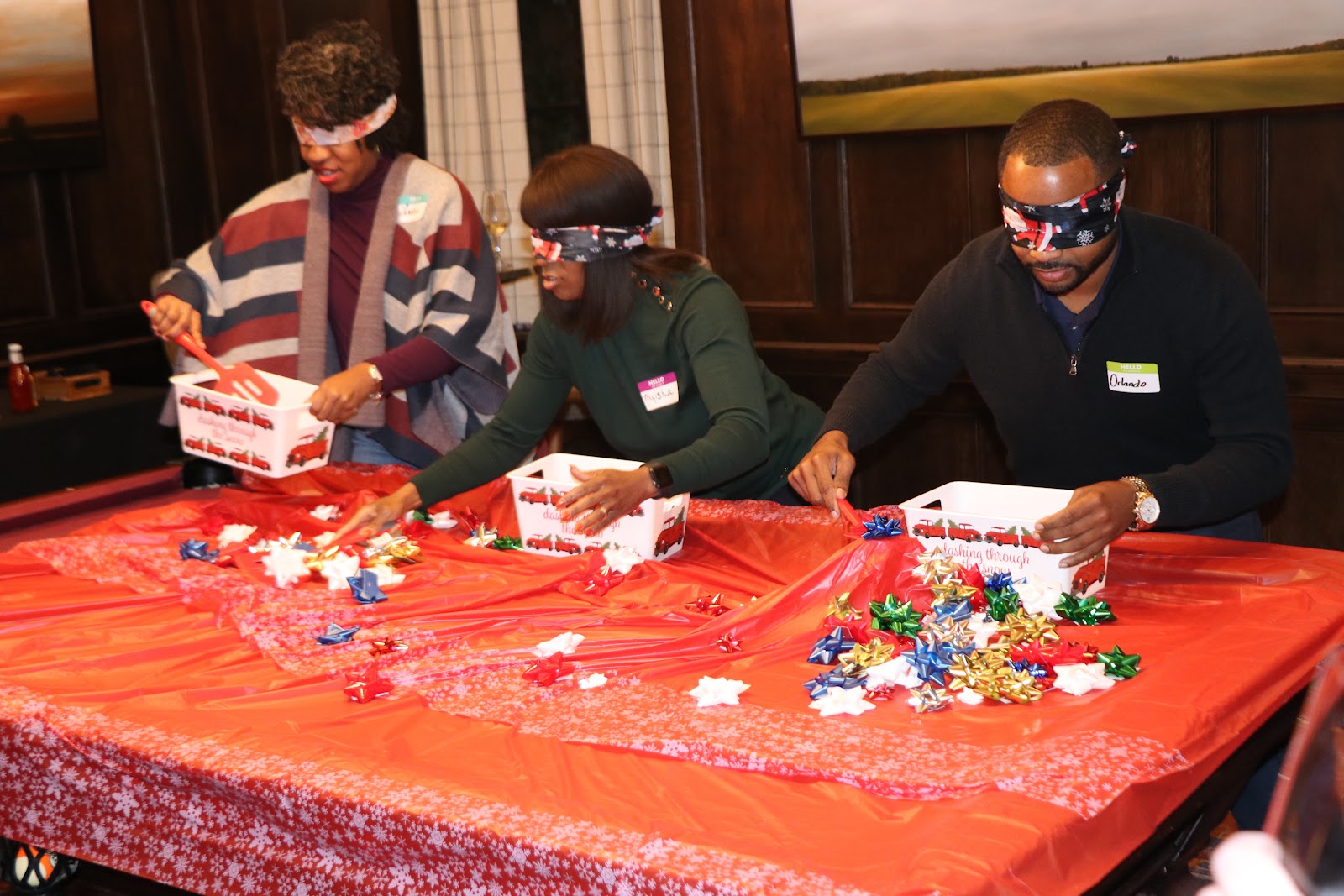 SMPHR members gift-wrapping at a holiday giving event