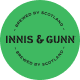 Innis & Gunn Brewing Co. Scotland circular logo with text in green on a dark background.