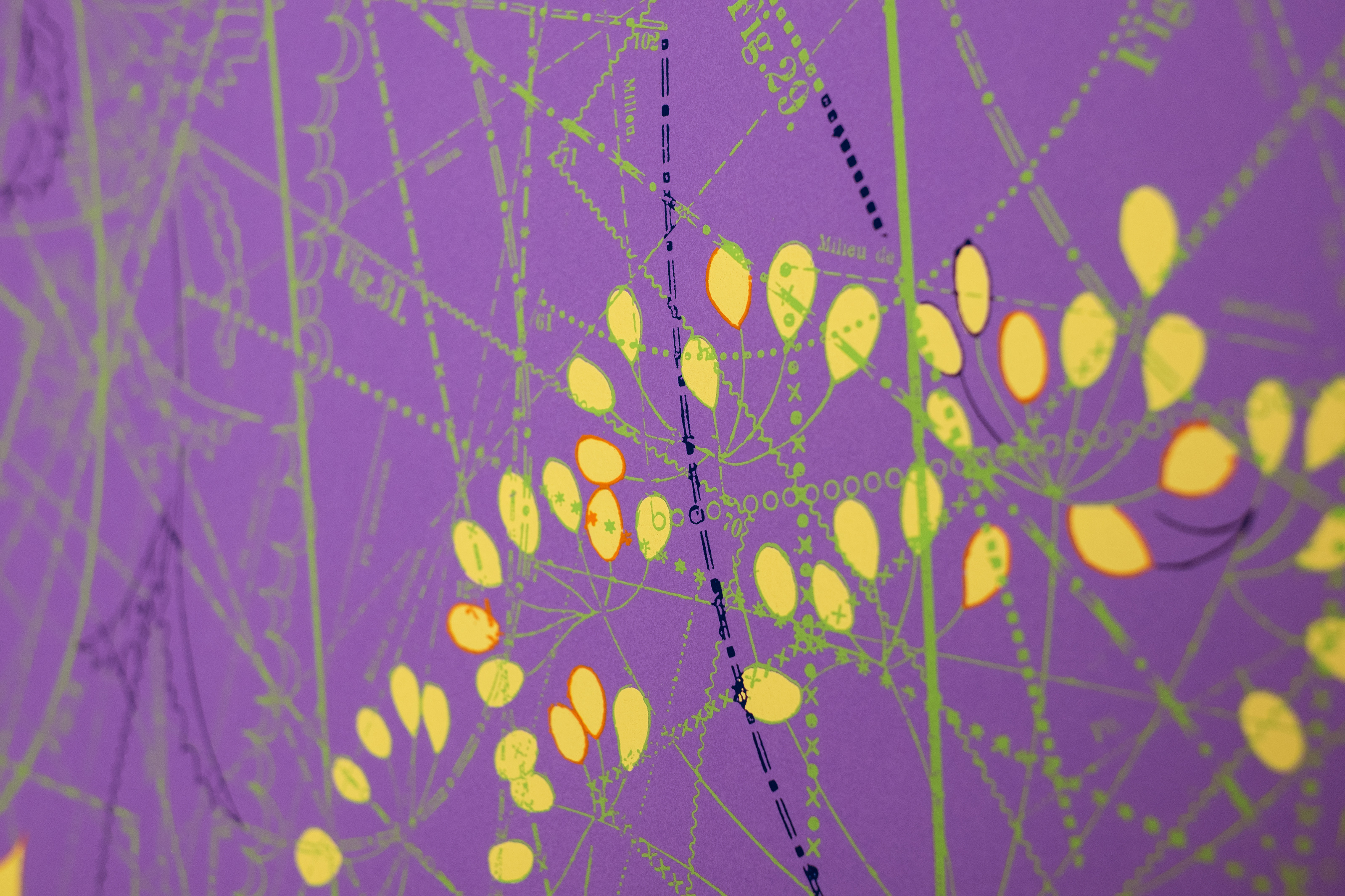 Detail of Between the Garden Lines (Purple) — clusters of yellow seed shapes on green stems, shot at a shallow angle