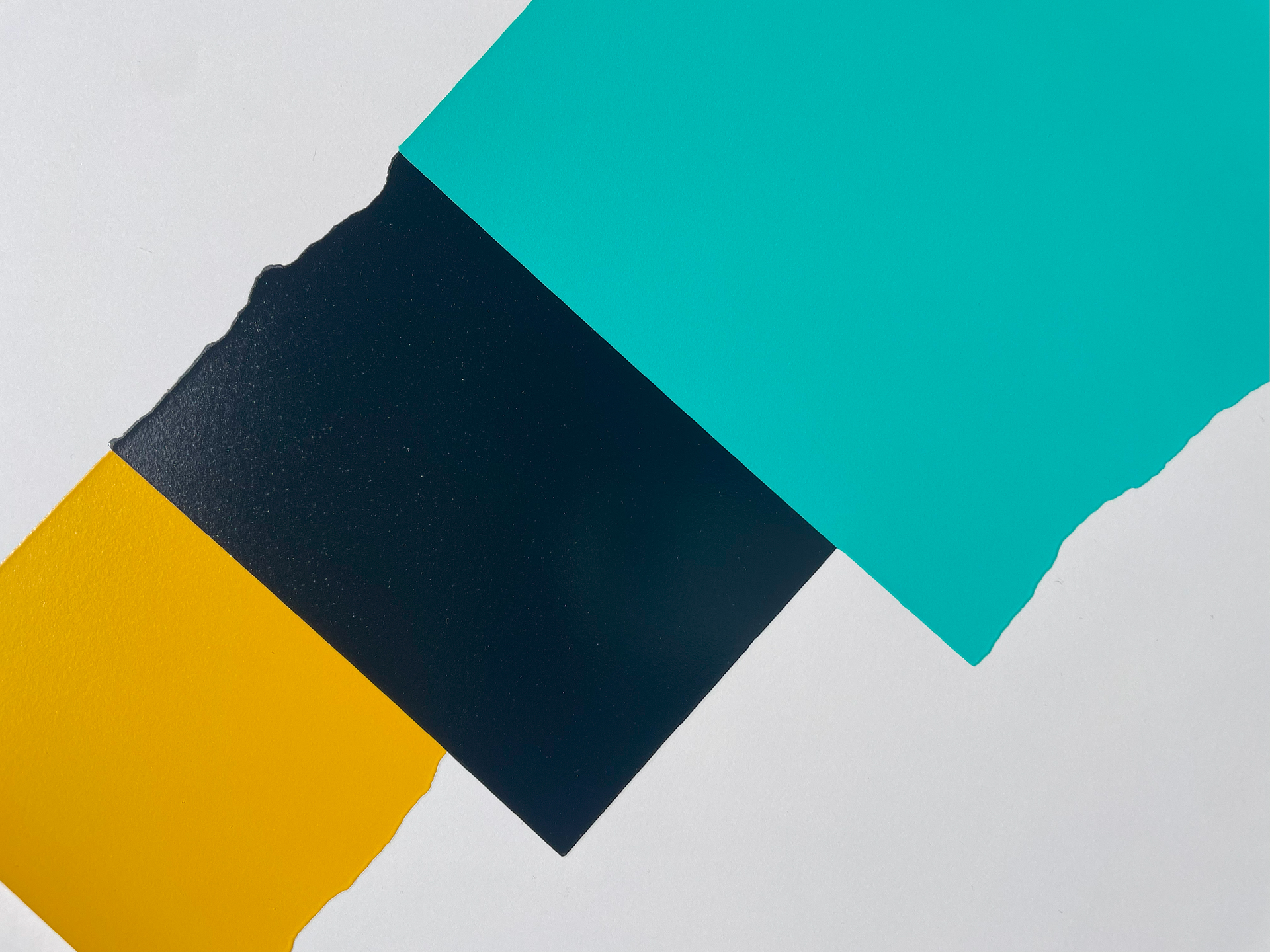 Detail of David Batchelor's Chromoscreen 1 — torn paper edges where the turquoise, black and yellow blocks meet.