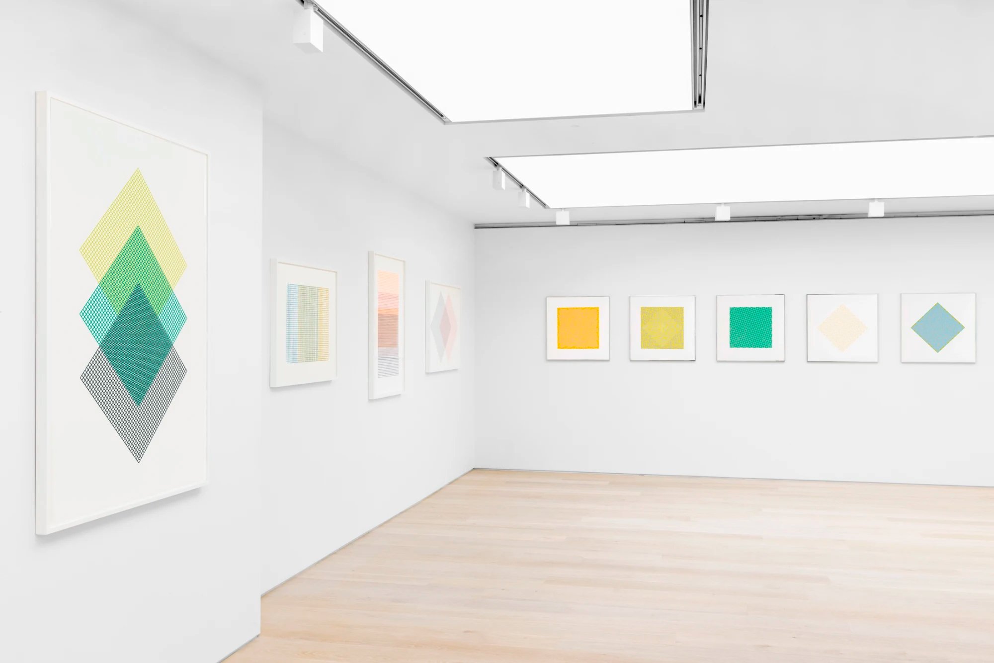 Sensing Abstraction at Cristea Roberts Gallery — gridded diamond and monochrome prints on three walls of a skylit space.