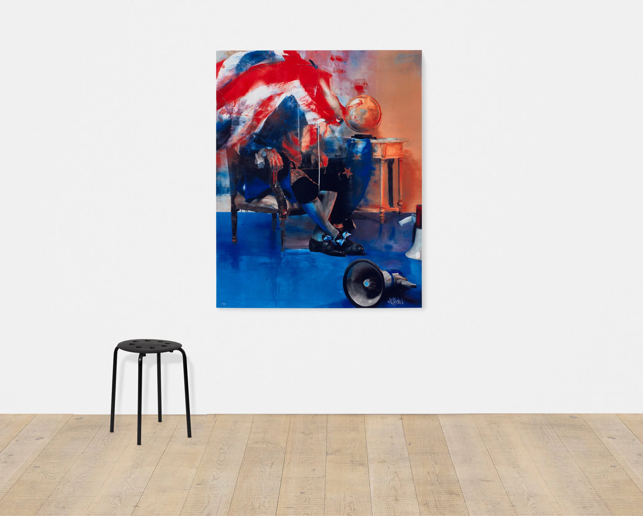 Conor Harrington's The Blind Exit, a large red, white and blue figurative print, hangs on a white gallery wall above a black stool.