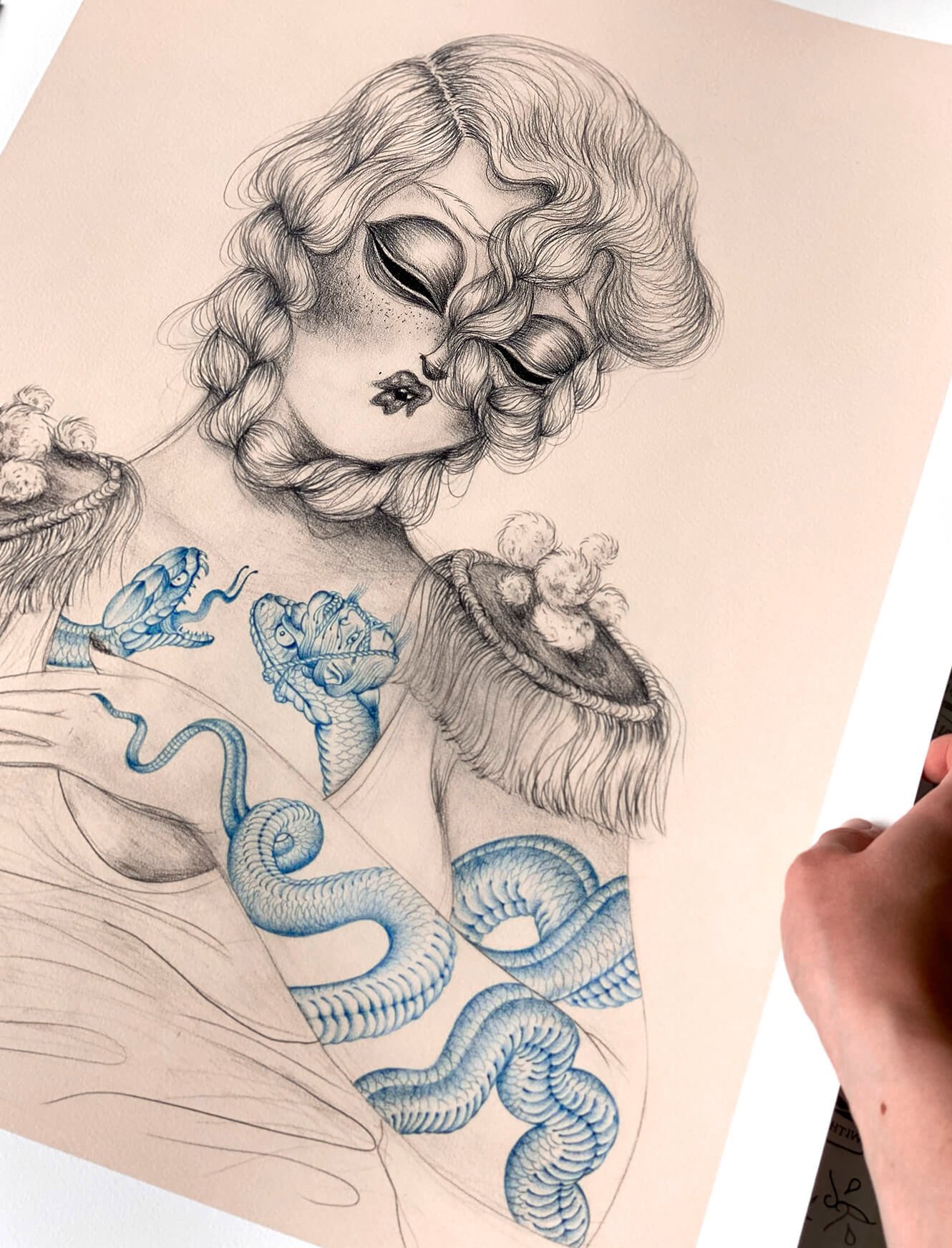 Miss Van & Ramon Maiden, Indigo Muse III (detail): the doll face and blue serpent tattoos coiling across her chest.