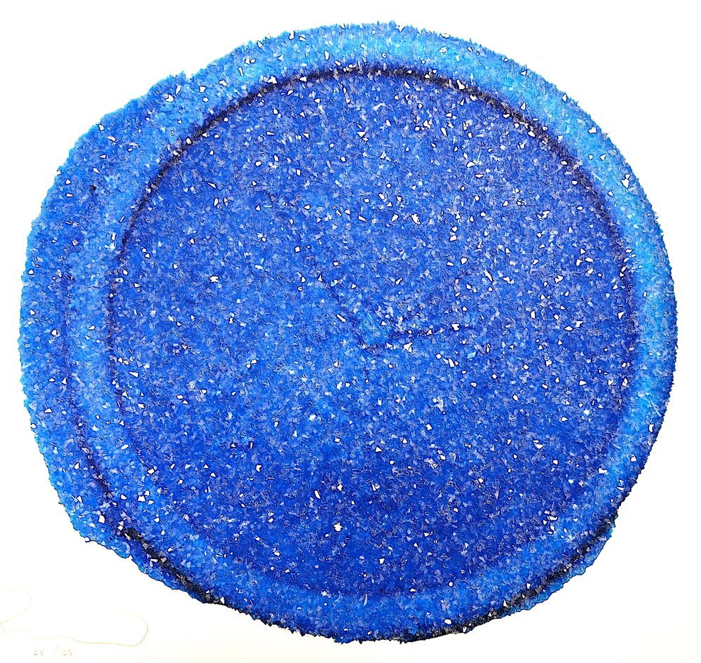 Roger Hiorns, Fielden House: a disc densely encrusted with sparkling blue crystals on white paper.