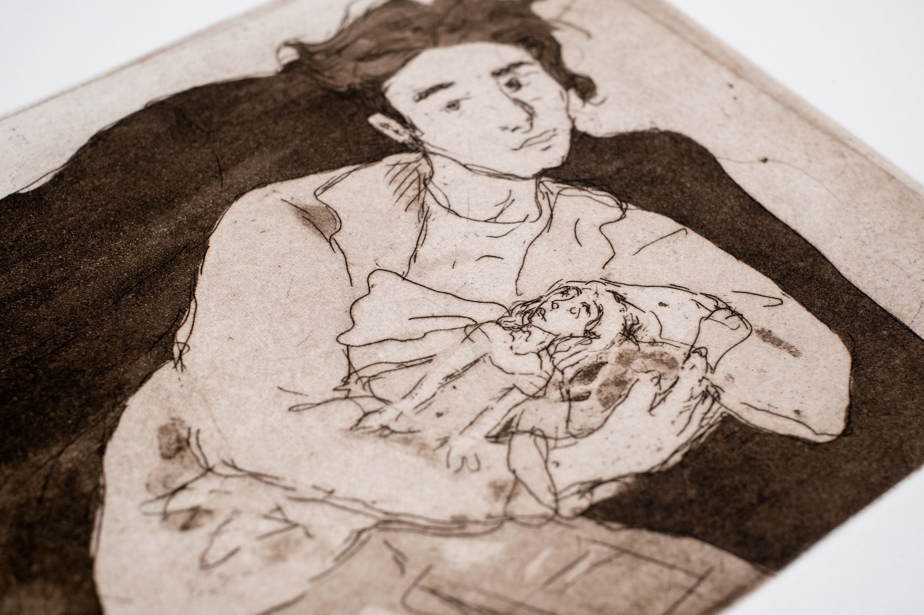 Liorah Tchiprout, I long only for small, playful things (detail): the figure cradling the little doll to their chest.