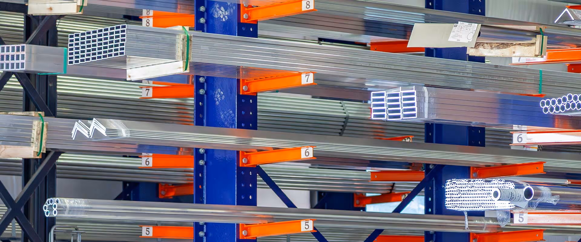 Aluminum tubing, extrusions, and metal stock inventory inside the ICI Metals warehouse and service center in Kent, Ohio.