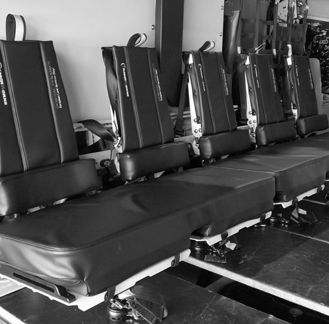 Energy-absorbing crew seating