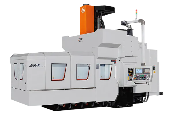 Large industrial CNC machining center with control panel and enclosed working area.