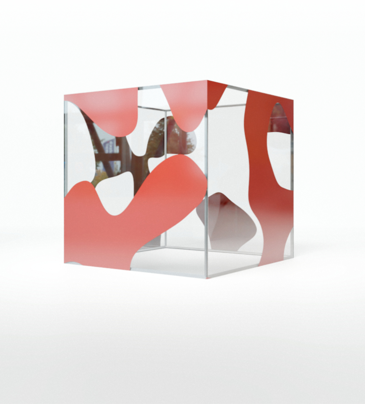 Transparent cube with red organic shapes on transparent glass panels on a white background.